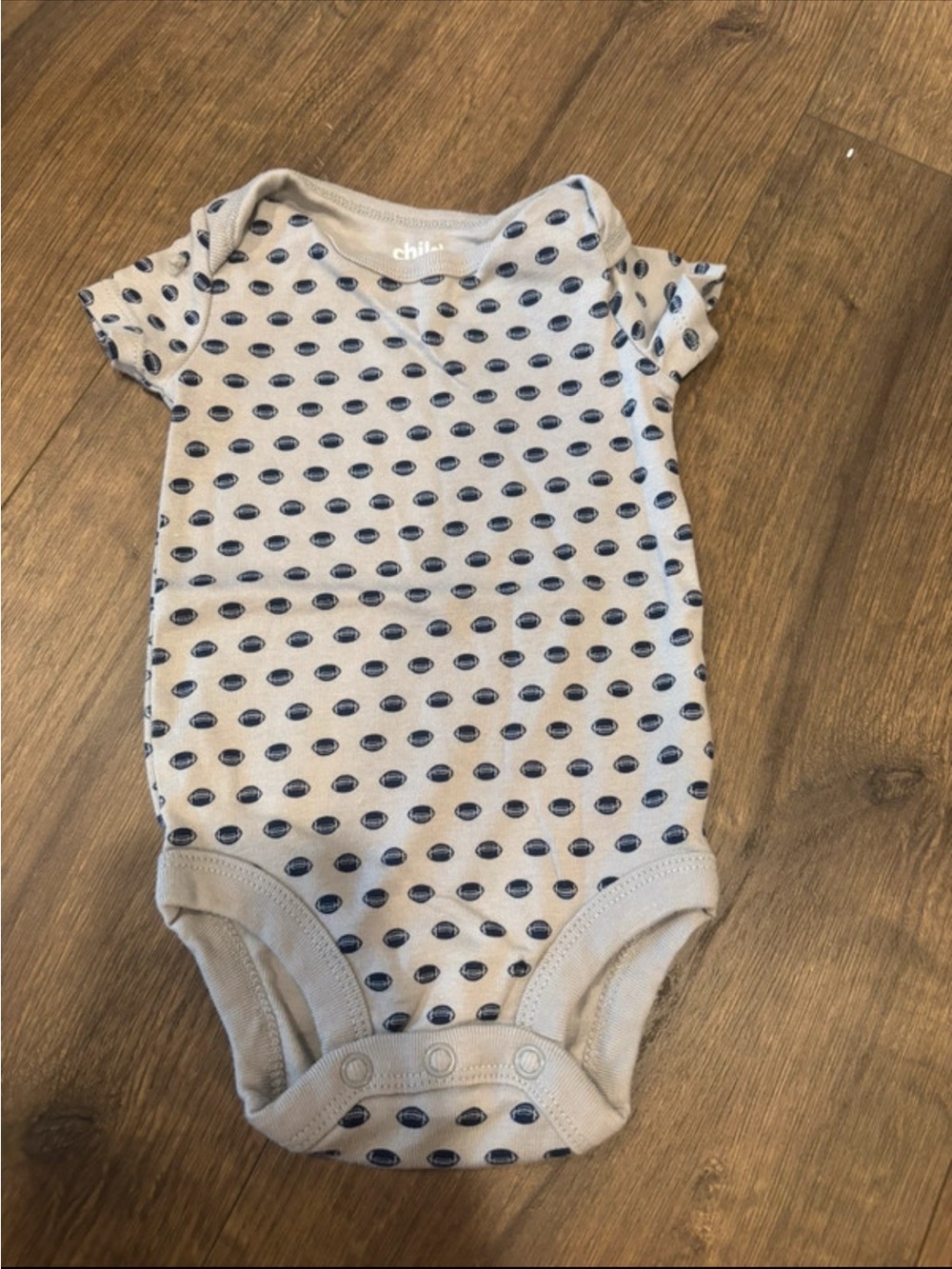 Nike Baby One-Piece Bodysuit in Gray with Navy Dot Print